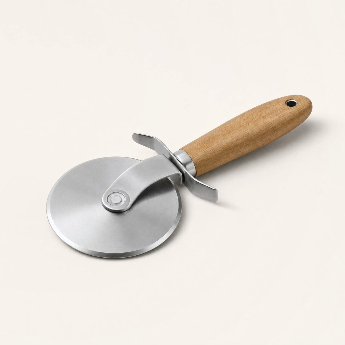 Pizza wheel with a stainless steel blade and wooden handle
