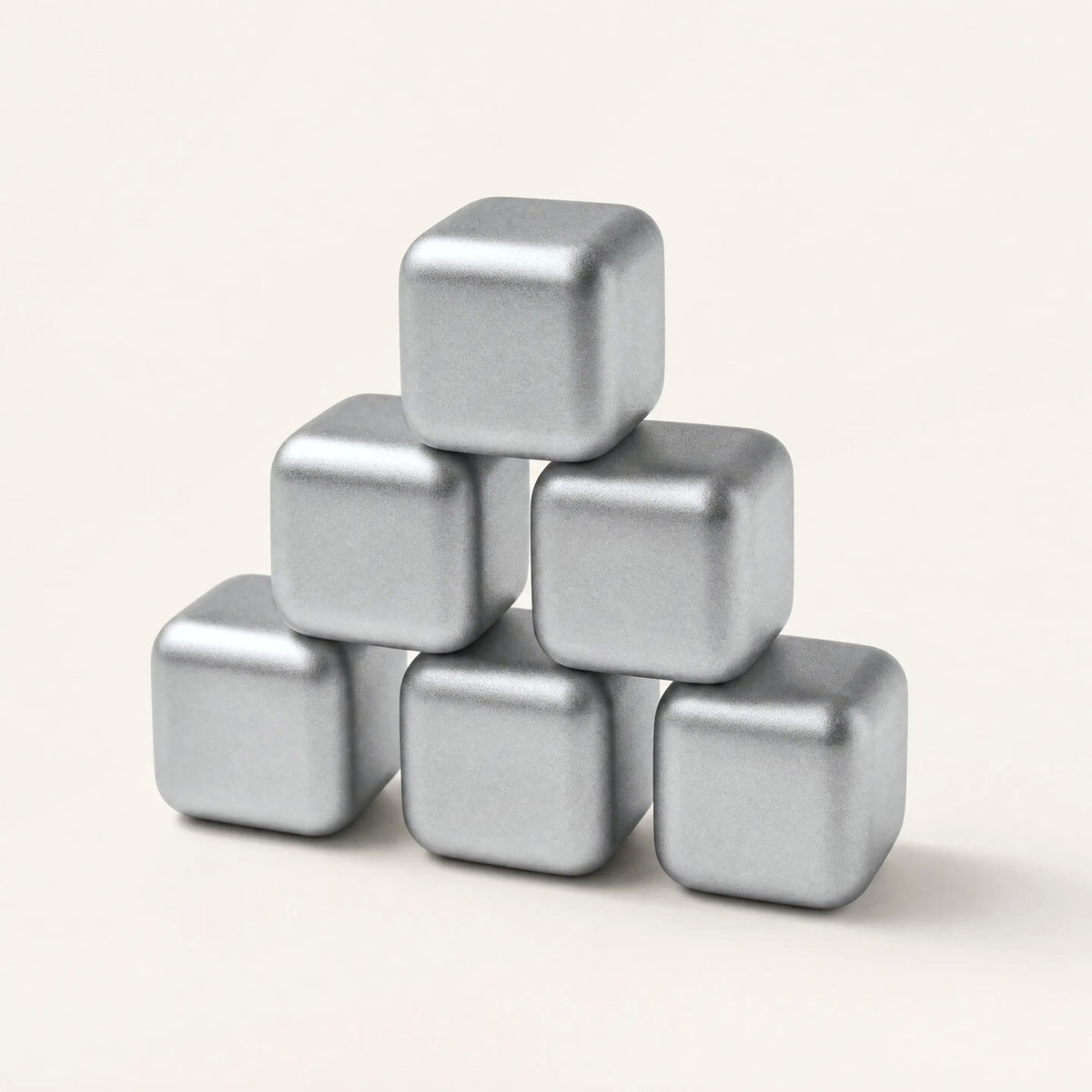 Six pure titanium ice cubes stacked in a pyramid