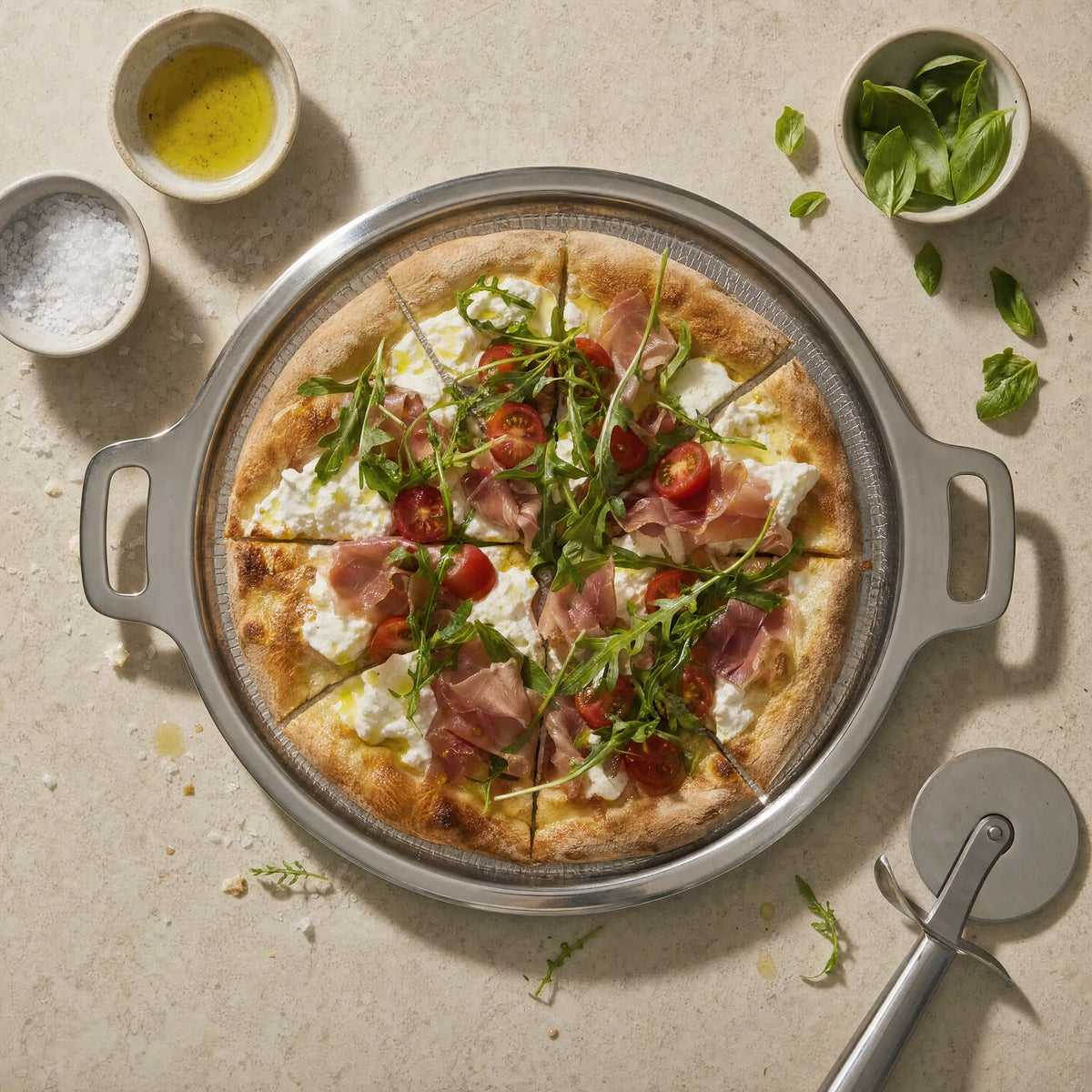 Burrata and prosciutto pizza on the titanium pizza steel from above